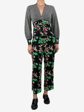 Black floral and star printed jumpsuit - size S