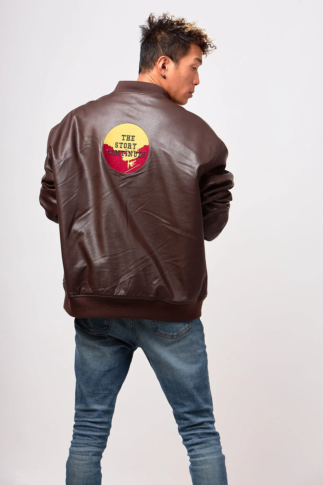 Brown faux Leather Bomber Jacket-embroidered the story quote