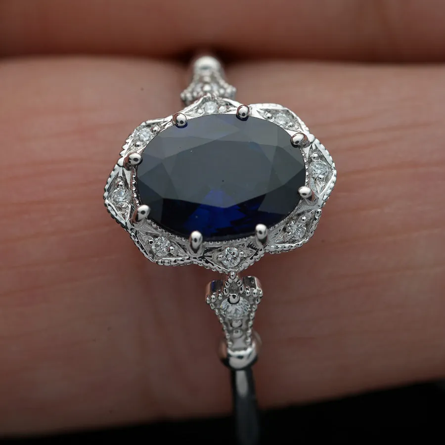 Natural blue sapphire Daisy oval halo engagement ring vintage inspired