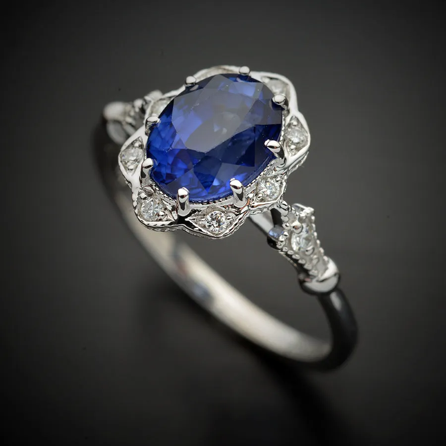 Natural blue sapphire Daisy oval halo engagement ring vintage inspired