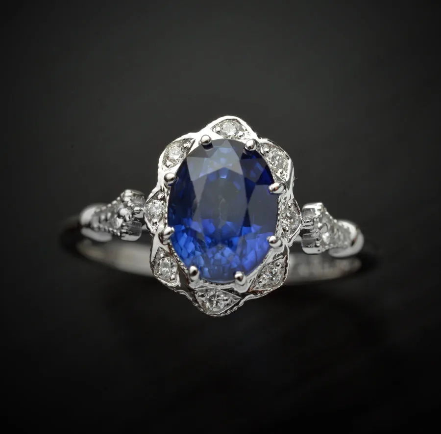 Natural blue sapphire Daisy oval halo engagement ring vintage inspired